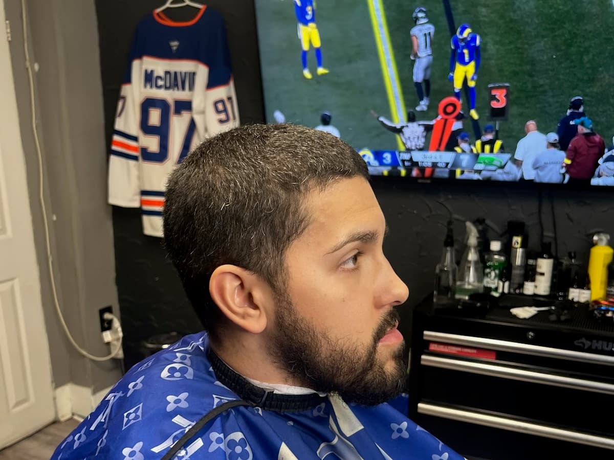 Short buzz taken even over the top with the beard left full and shaped